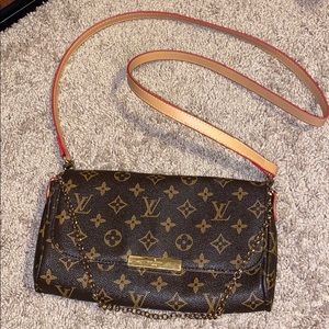 Louis Vuitton small shoulder purse.